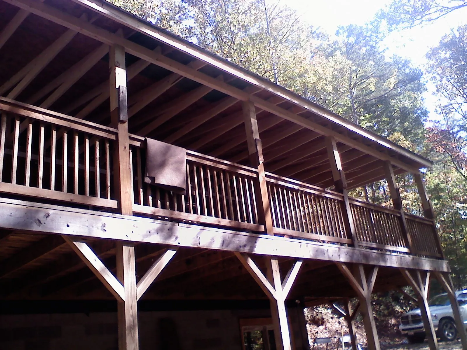 Timber framing under a new elevated porch and deck — Roof Leak Repair in Arroyo Hondo by Roofing Brothers